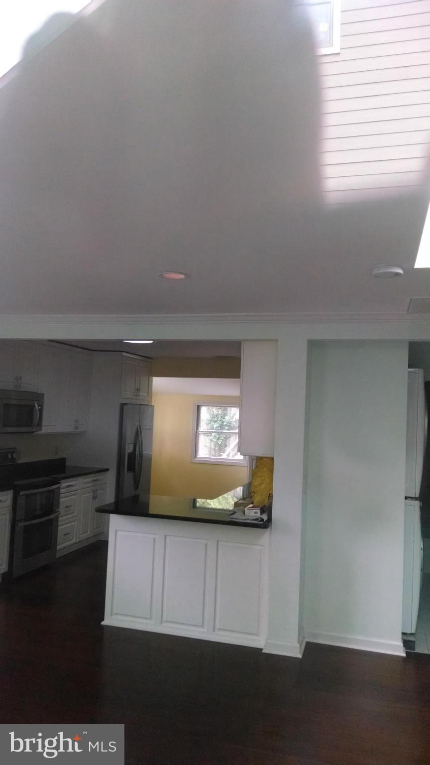 15 McKay Circle Cabin John, MD 20818 - Photo 7 of 20 a living room with furniture and a window
