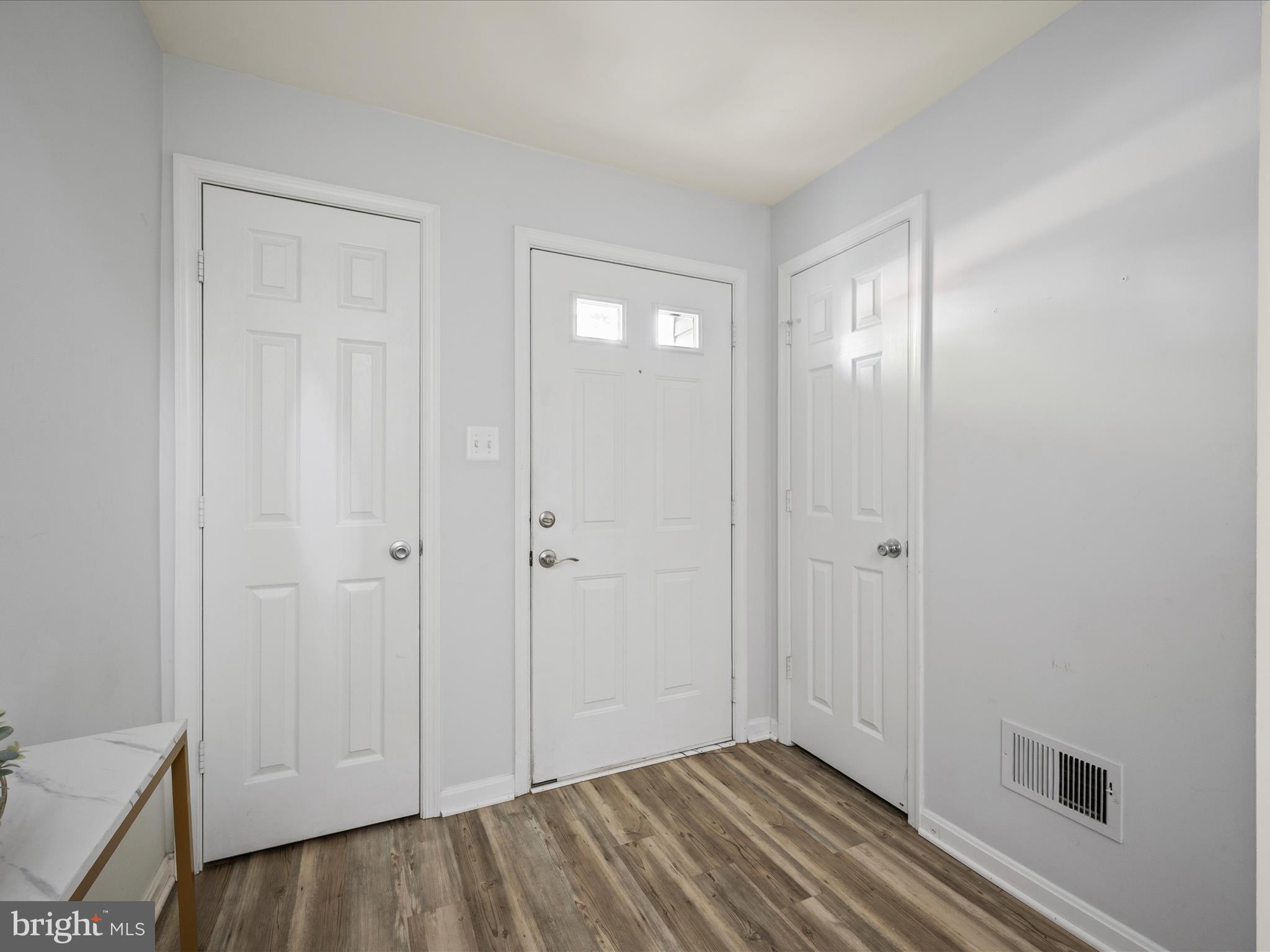 20198 Brookview Square Ashburn, VA 20147 - Photo 5 of 61 a view of hallway with closet and bathroom