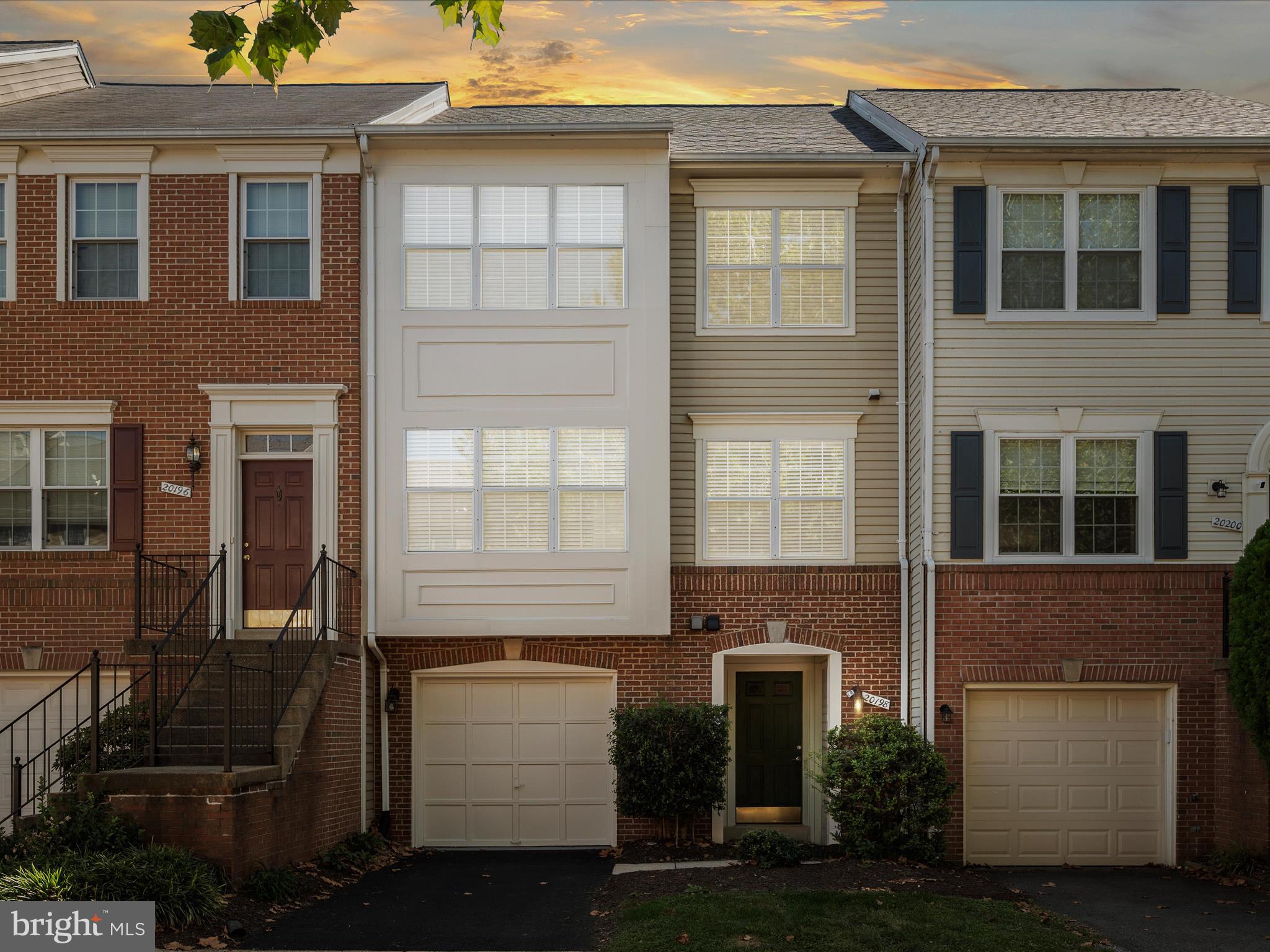 20198 Brookview Square Ashburn, VA 20147 - Photo 51 of 61 a front view of a house with a yard
