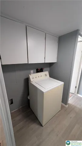 a utility room with washer and dryer