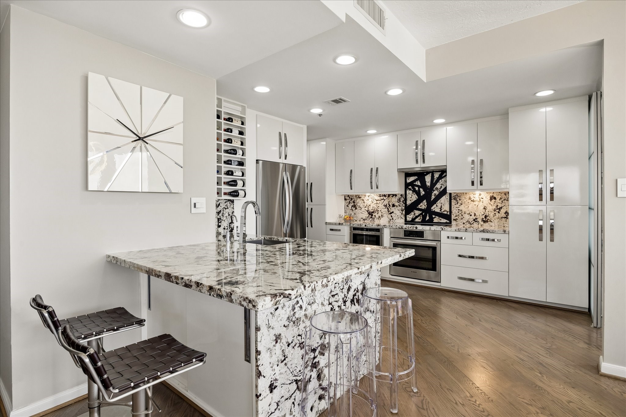 3350 McCue Road, Unit 1101 Houston, TX 77056 - Photo 1 of 31 Unique granite counters, custom cabinets, Bosch appliances, 2 pantries, custom metal work above cooktop.