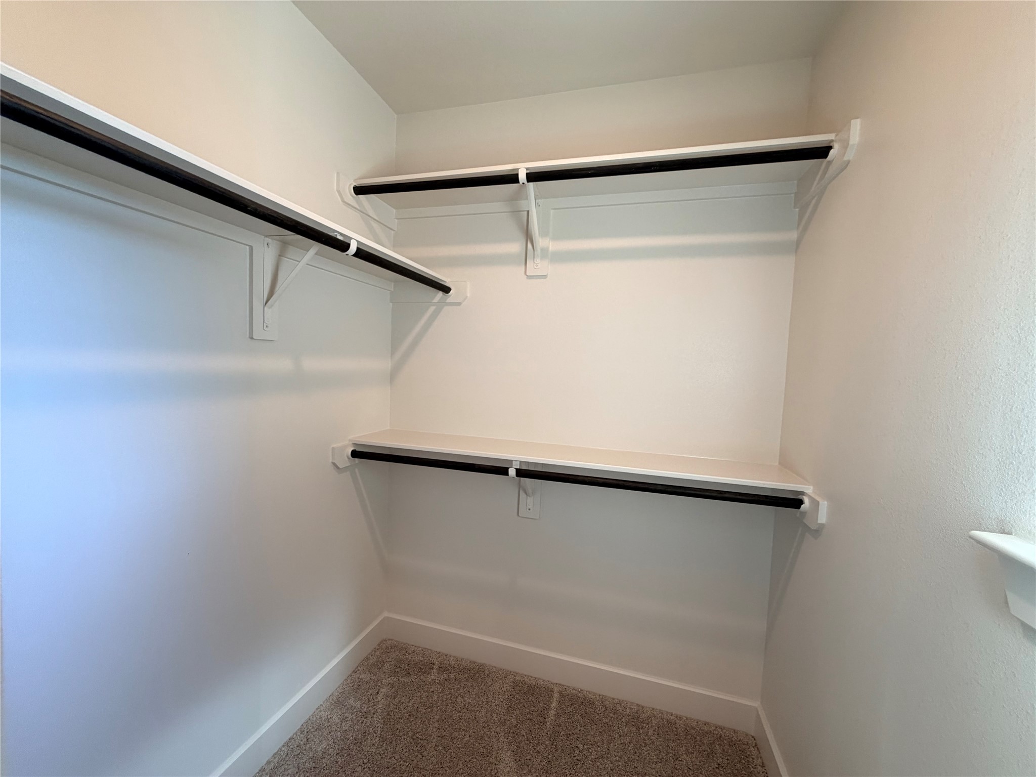 31174 Riley Hts Drive Fulshear, TX 77441 - Photo 29 of 38 Walk-in closet w/ window in ensuite bedroom