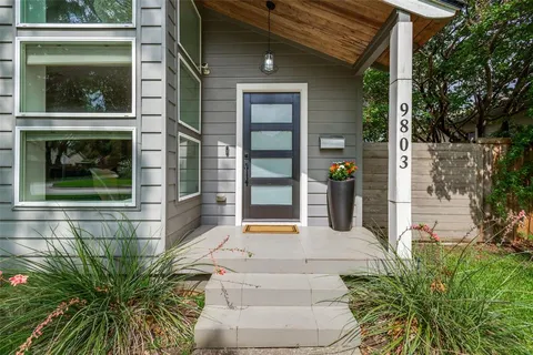 a front view of a house with a porch