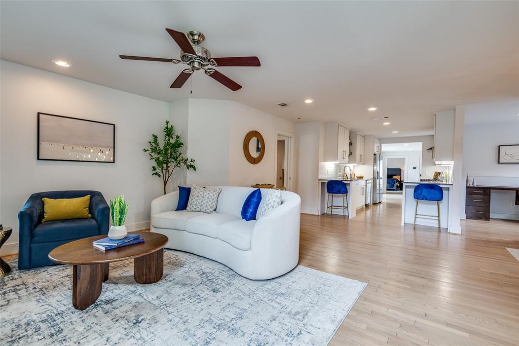 9803 Lakemont Drive Dallas, TX 75220 - Photo 3 of 13 a living room with furniture and kitchen view