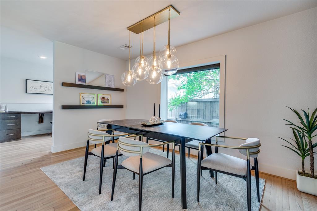 9803 Lakemont Drive Dallas, TX 75220 - Photo 4 of 13 a view of a dining room with furniture a chandelier and wooden floor