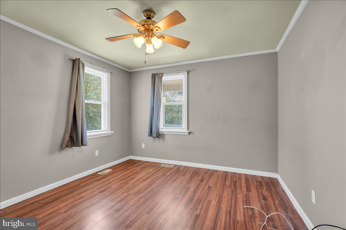 211 South Cedar Avenue Maple Shade, NJ 08052 - Photo 14 of 34 Bright bedroom with ceiling fan