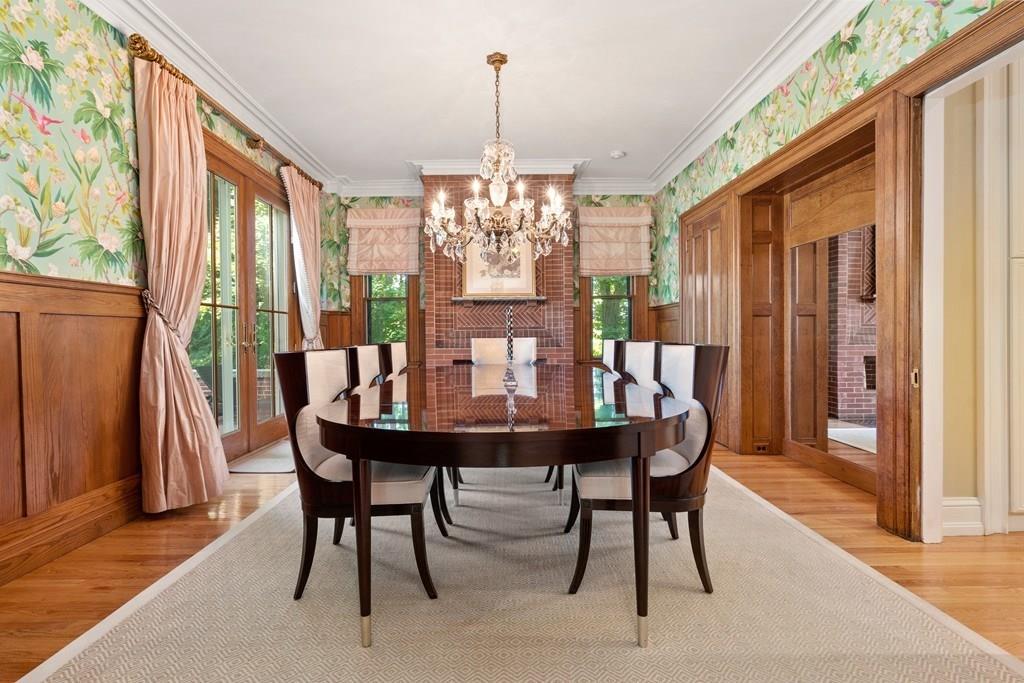 699 Boston Post Road Weston, MA 02493 - Photo 11 of 41 a view of a dining room with furniture window and wooden floor