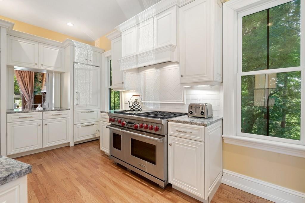 699 Boston Post Road Weston, MA 02493 - Photo 17 of 41 a kitchen with a stove oven and sink