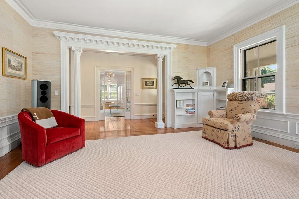 699 Boston Post Road Weston, MA 02493 - Photo 21 of 41 a living room with furniture and a large window