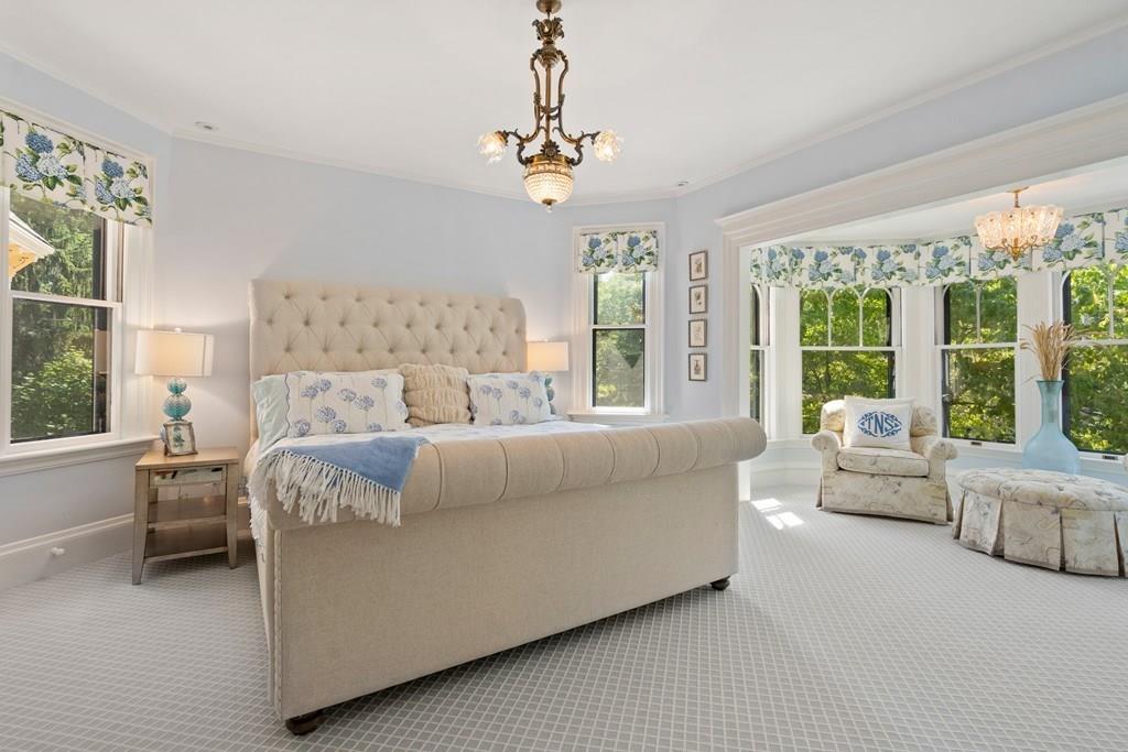 699 Boston Post Road Weston, MA 02493 - Photo 23 of 41 a living room with furniture and a large window