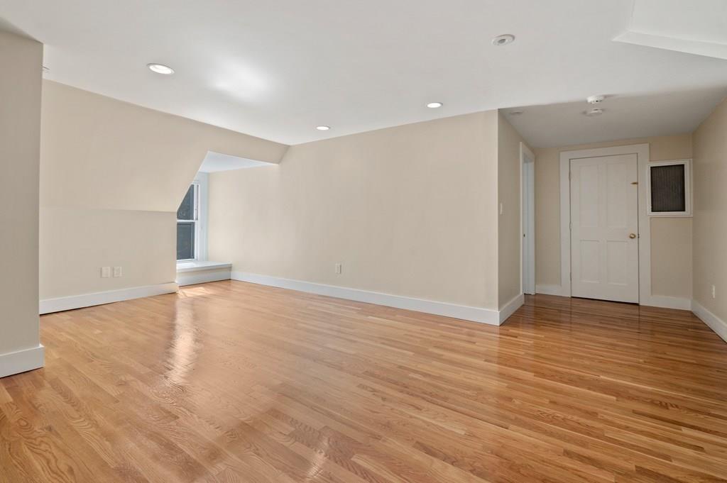 699 Boston Post Road Weston, MA 02493 - Photo 29 of 41 a view of empty room with wooden floor