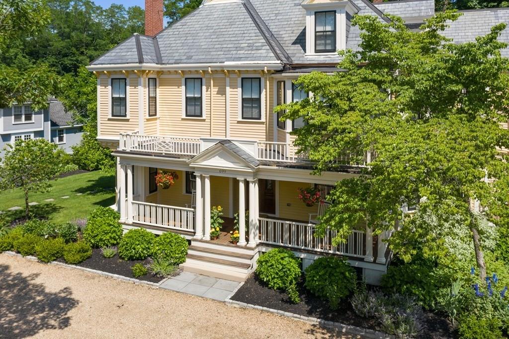 699 Boston Post Road Weston, MA 02493 - Photo 36 of 41 front view of a house with a yard