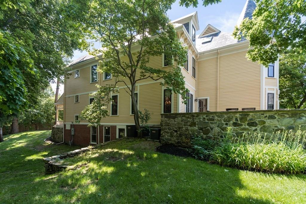 699 Boston Post Road Weston, MA 02493 - Photo 38 of 41 a view of a house with a garden