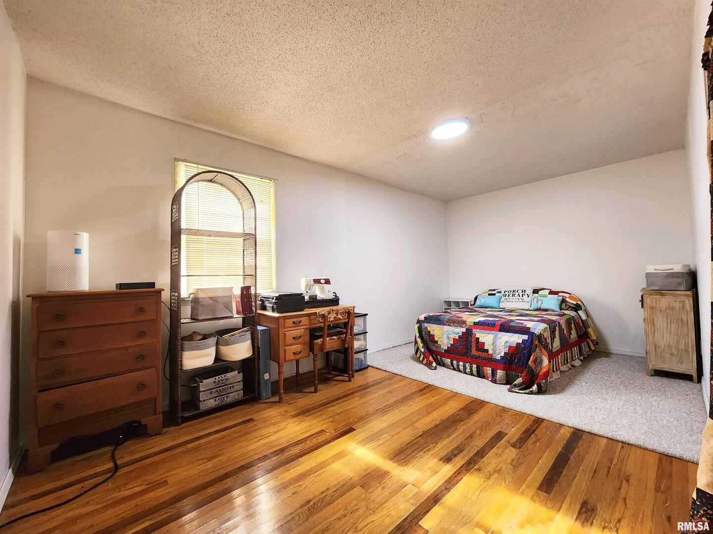 355 Chestnut Street Alto Pass, IL 62905 - Photo 14 of 26 a bedroom with a bed and a cabinets