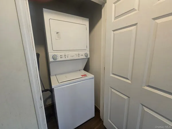 a utility room with dryer and washer