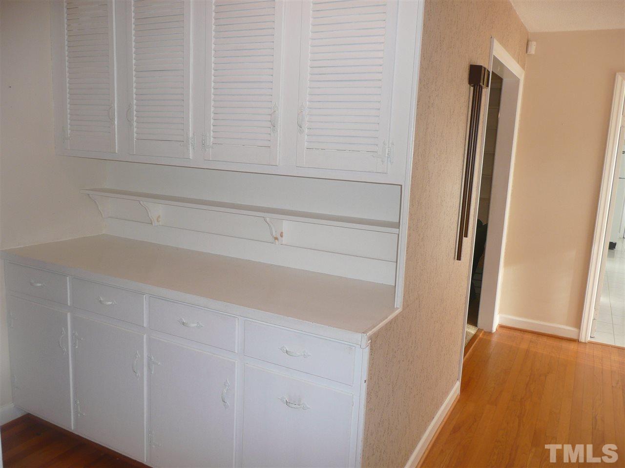 234 Forbes Road Wake Forest, NC 27587 - Photo 18 of 21 Tons of towel and linens space. Even a tilt out hamper.
