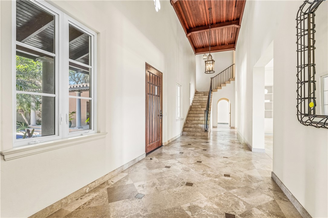 2350 Quay Dock Road Vero Beach, FL 32967 - Photo 12 of 35 a view of a hallway with wooden floor and entryway