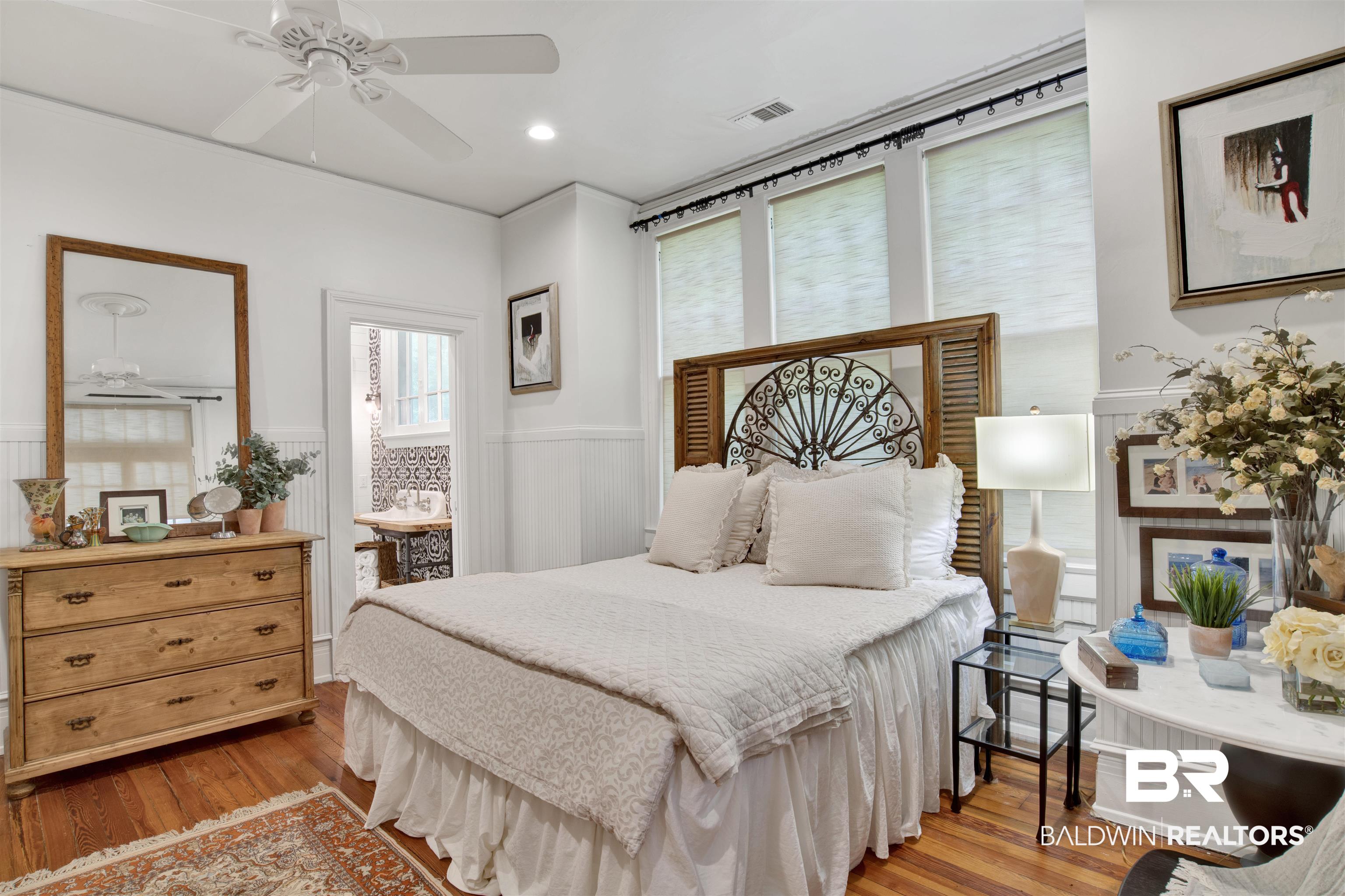 1654 Government Street Mobile, AL 36604 - Photo 40 of 45 Bedroom with ceiling fan and hardwood / wood-style flooring