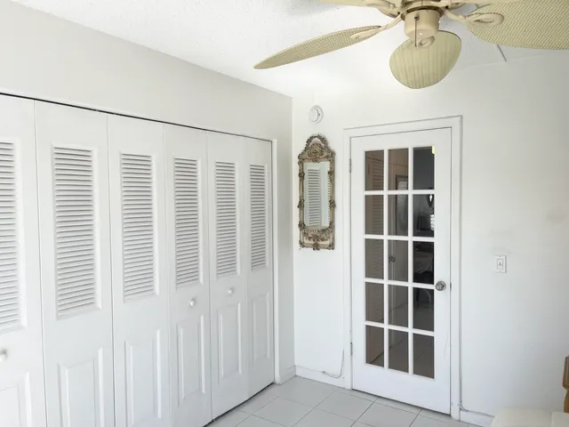 a view of a lake with houses in the back