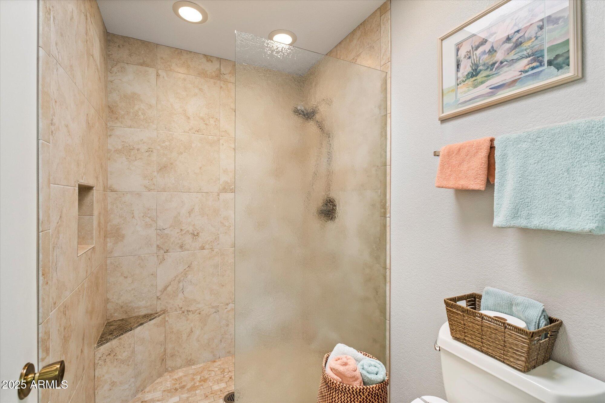 18720 East Vía Laguna Rio Verde, AZ 85263 - Photo 21 of 37 a bathroom with a shower curtain and a sink