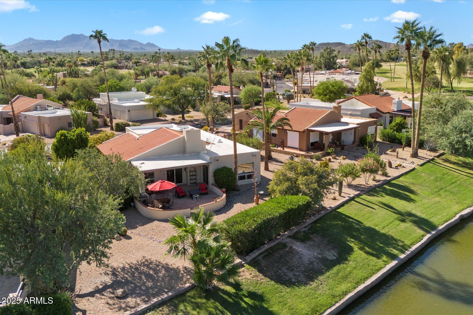 18720 East Vía Laguna Rio Verde, AZ 85263 - Photo 29 of 37 an aerial view of residential houses with outdoor space and river