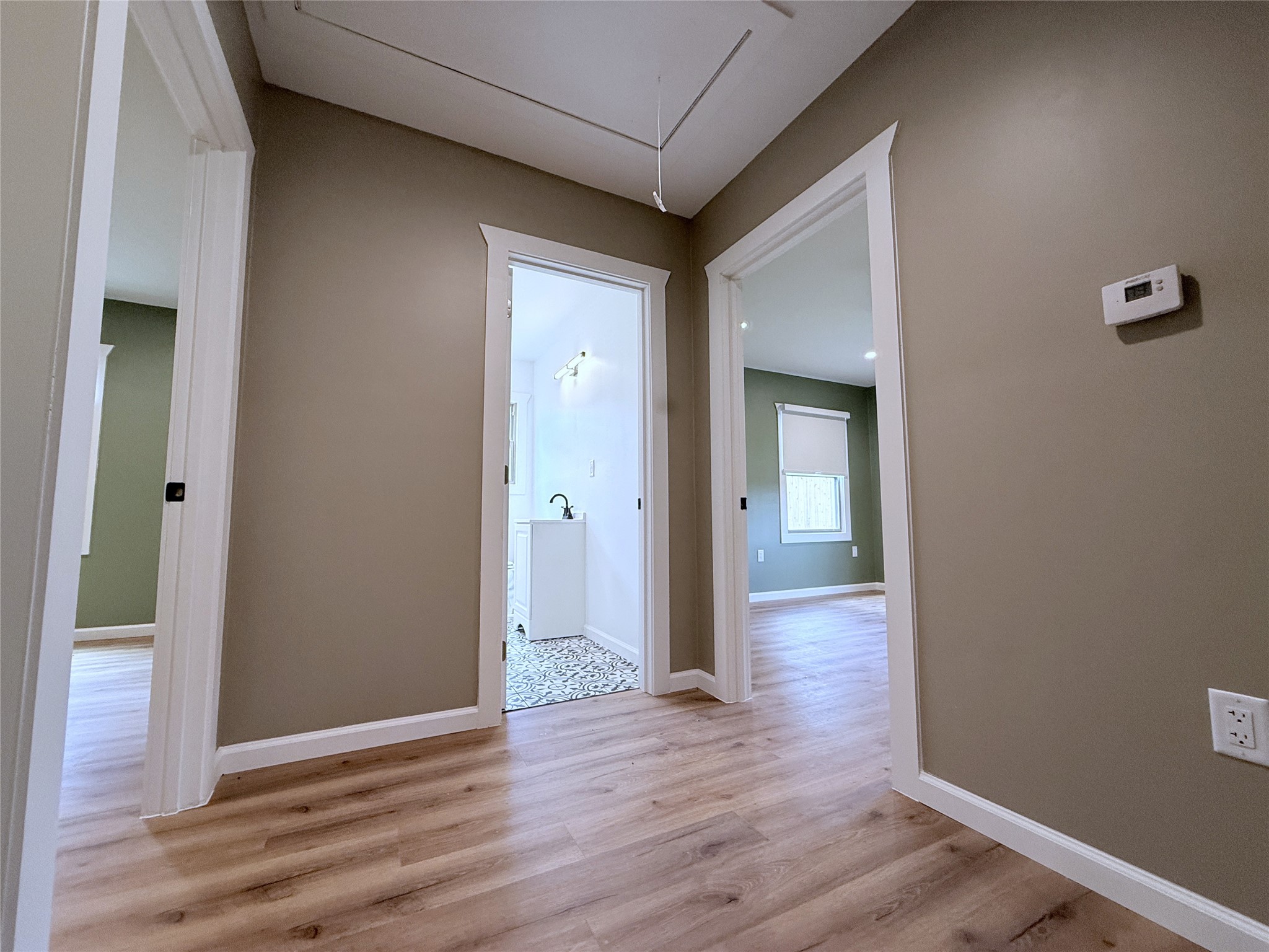 1922 Tabor Street Houston, TX 77009 - Photo 12 of 24 The two secondary bedrooms do not share walls, the bathroom is in between.