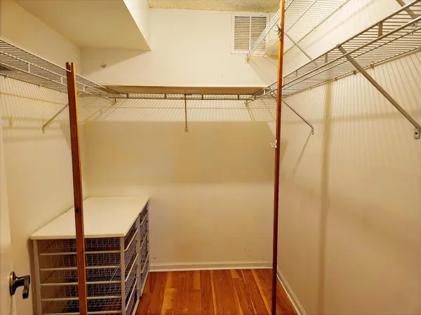a bathroom with a shower and a window