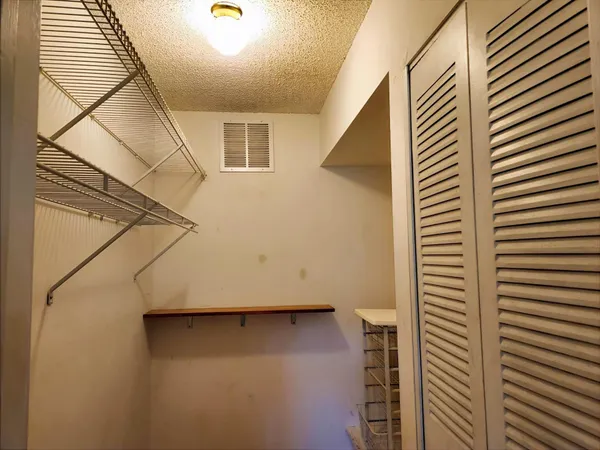 a view of a house with a street