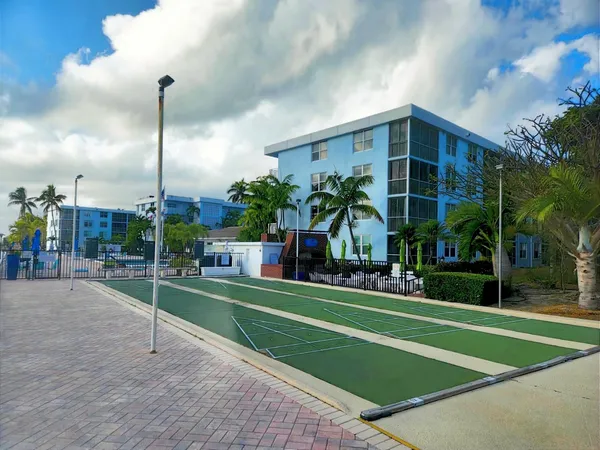 a view of swimming pool from a balcony