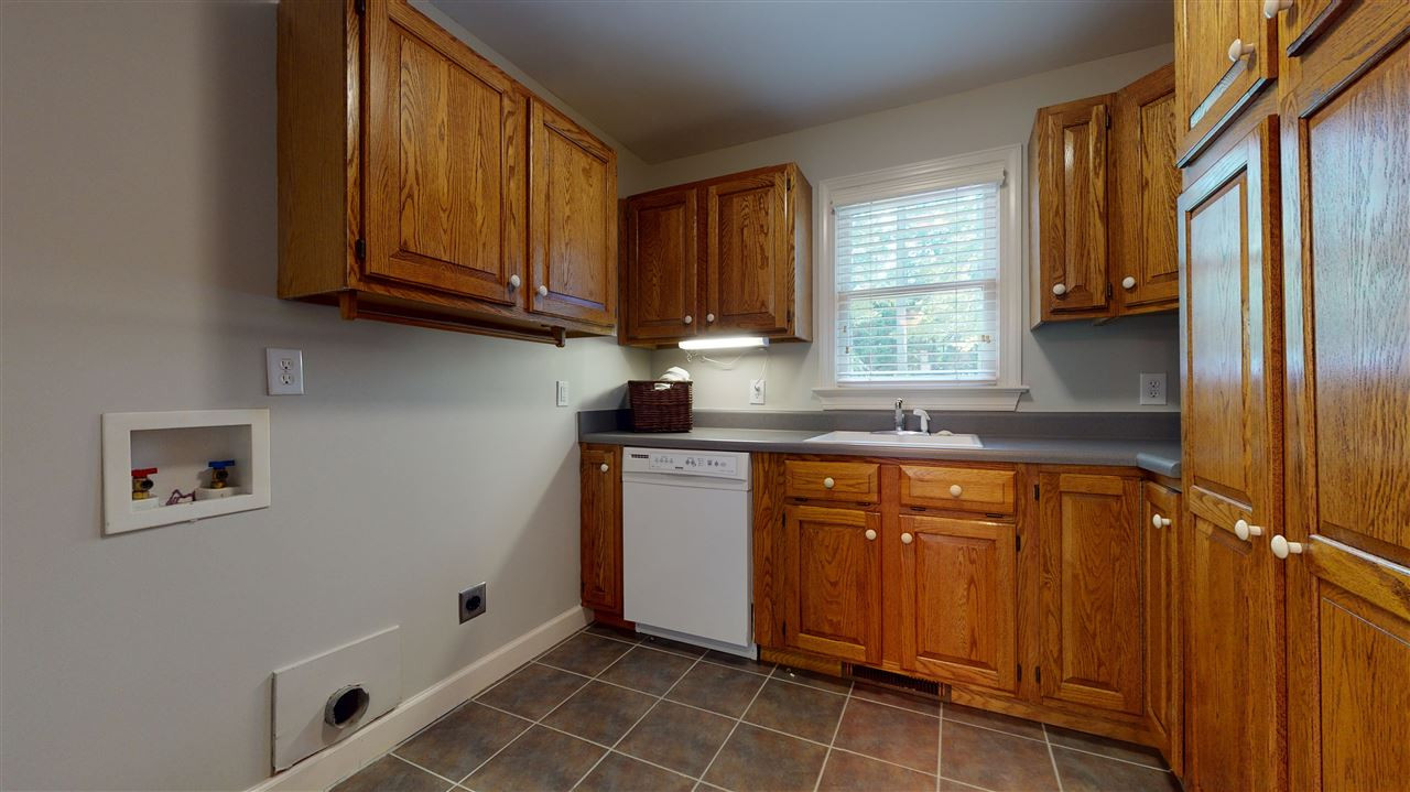 3132 Mt Vernon Church Road Raleigh, NC 27613 - Photo 21 of 30 Laundry with Tons of Cabinets and Storage. It even has a second washer.