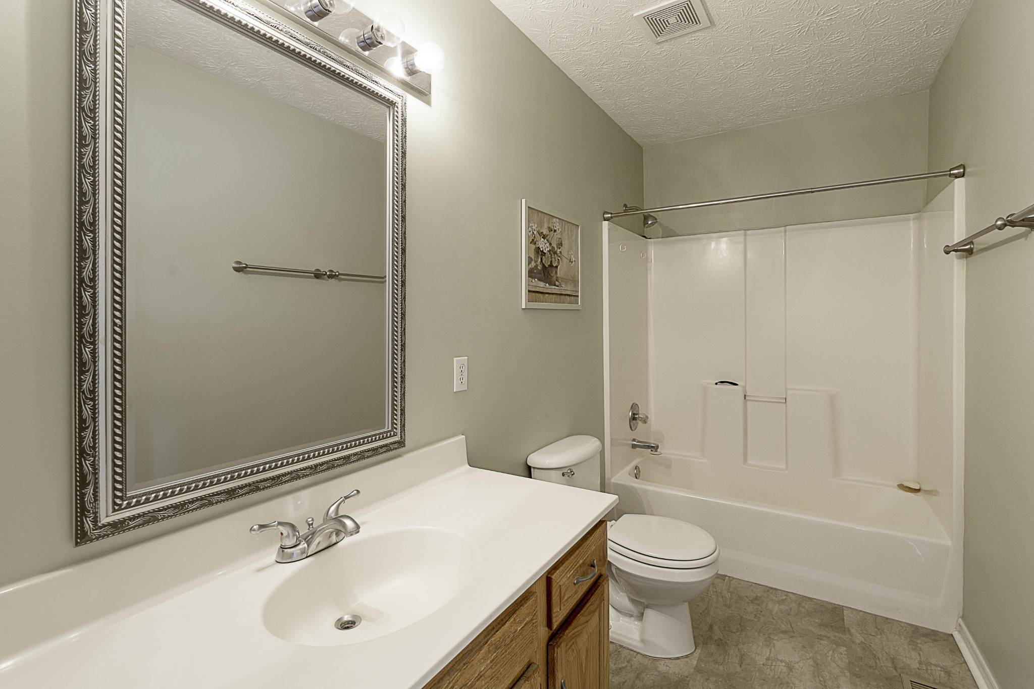 4034 Douglas Dam Road Kodak, TN 37764 - Photo 11 of 19 a bathroom with a sink toilet and shower