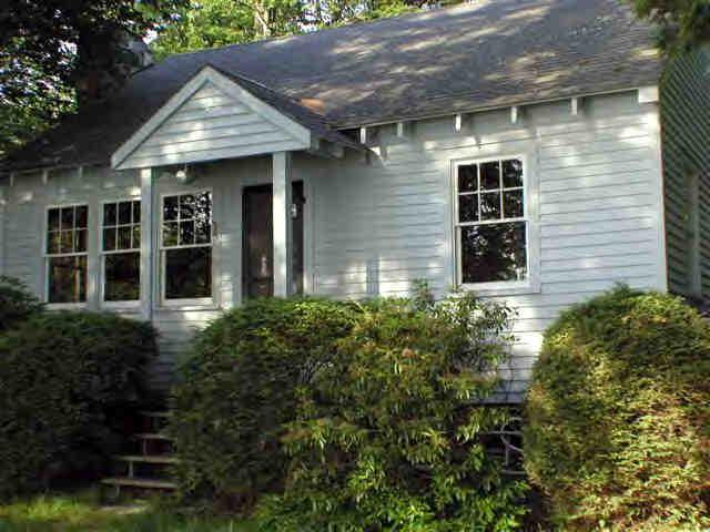 16 Pine Ext Road East Otis, MA 01029 - Photo 1 of 6 a front view of a house with a yard