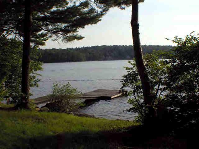 16 Pine Ext Road East Otis, MA 01029 - Photo 2 of 6 a view of lake with green yard
