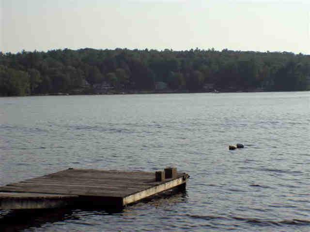 16 Pine Ext Road East Otis, MA 01029 - Photo 6 of 6 a view of wooden floor next to a lake