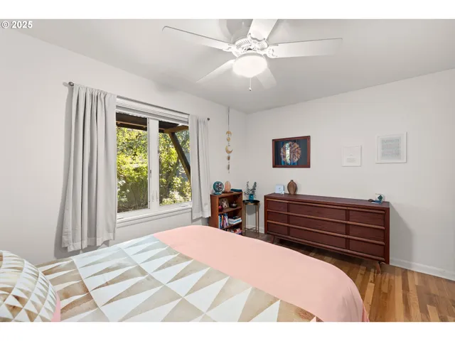 a bathroom with a sink and two mirror