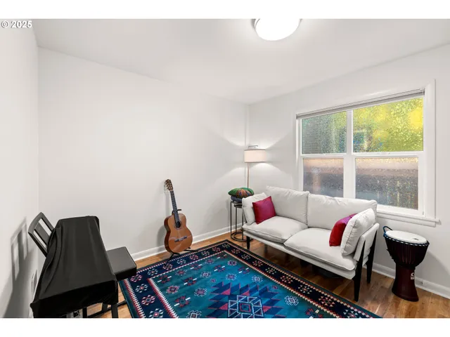 a living room with furniture and window