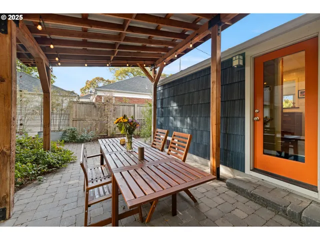 a view of sitting area with furniture and wooden deck