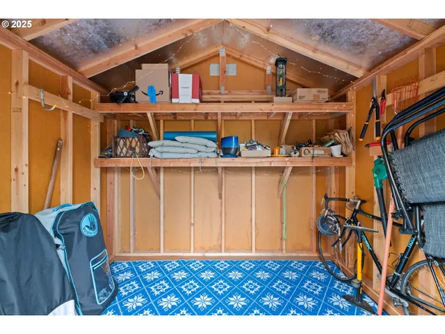 a view of a house with potted plants