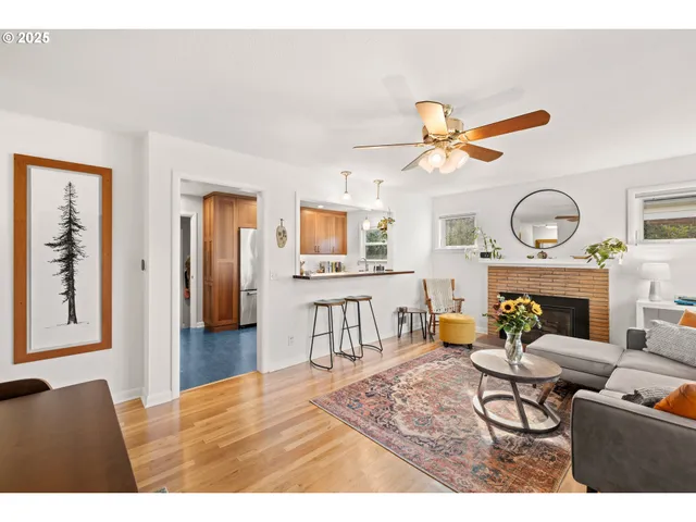 a bedroom with furniture and a fireplace