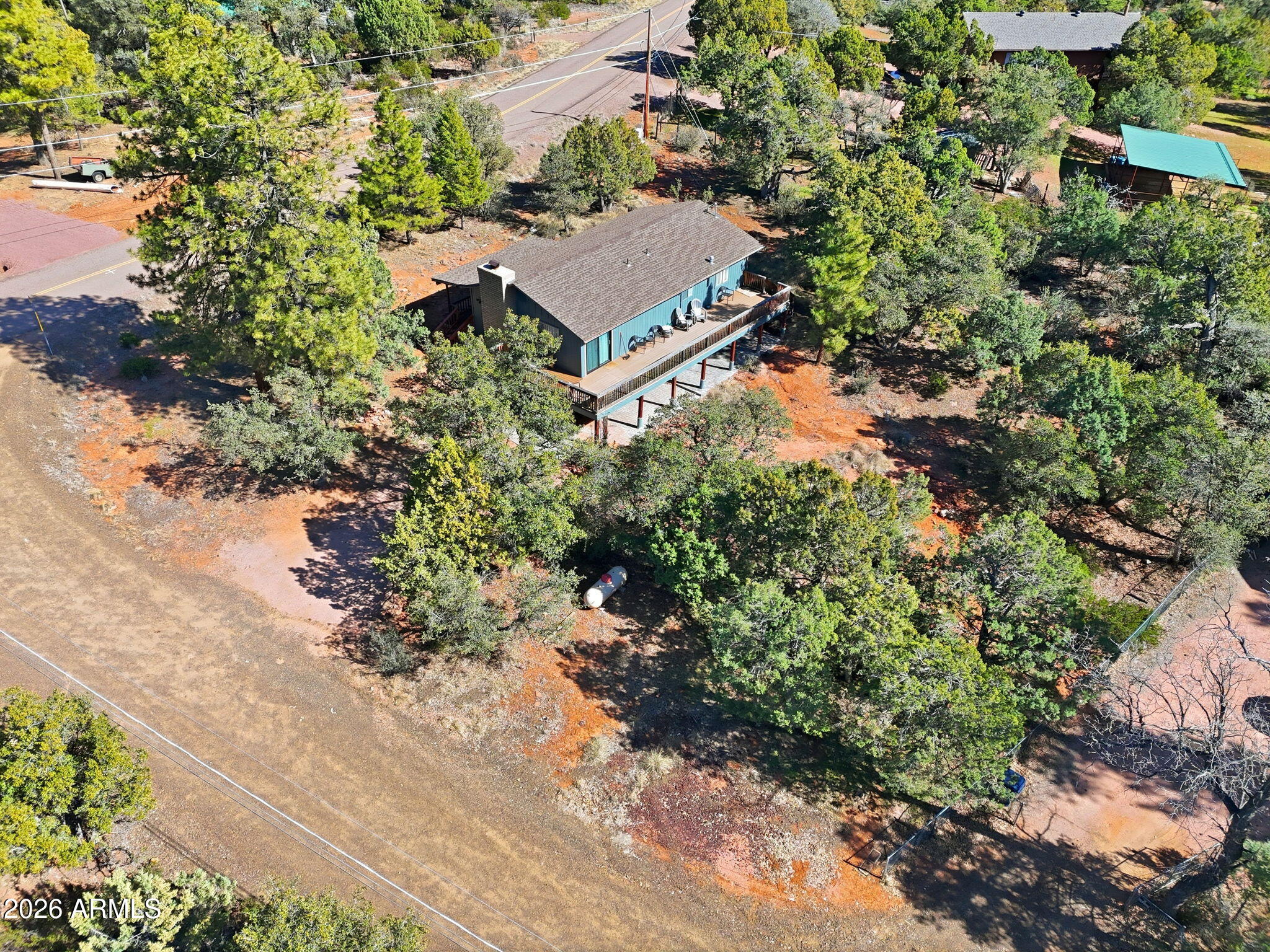 8247 Ralls Drive Pine, AZ 85544 - Photo 32 of 50 an aerial view of a house with yard and outdoor space
