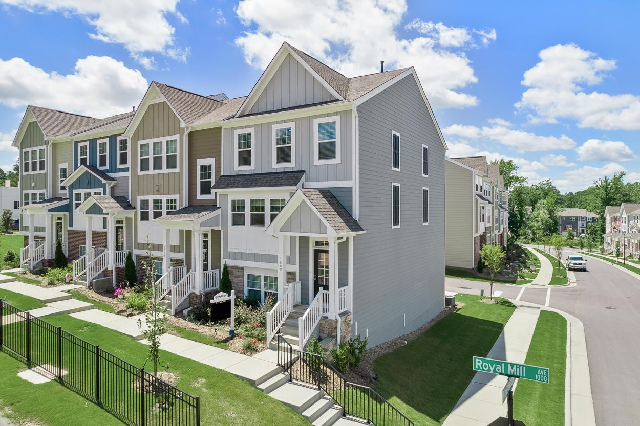 1002 Royal Mill Avenue Wake Forest, NC 27587 - Photo 1 of 51 a front view of a house with garden