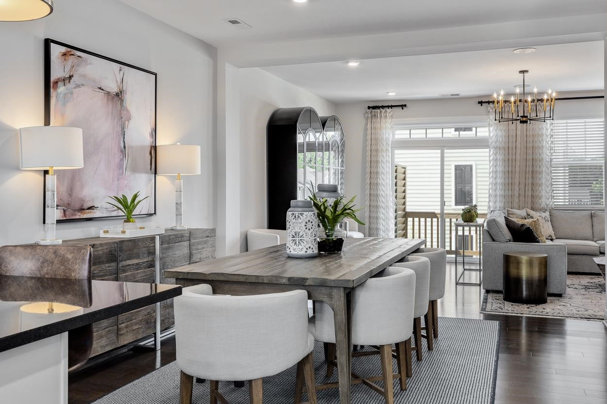 1002 Royal Mill Avenue Wake Forest, NC 27587 - Photo 11 of 51 a view of a dining room with furniture and wooden floor