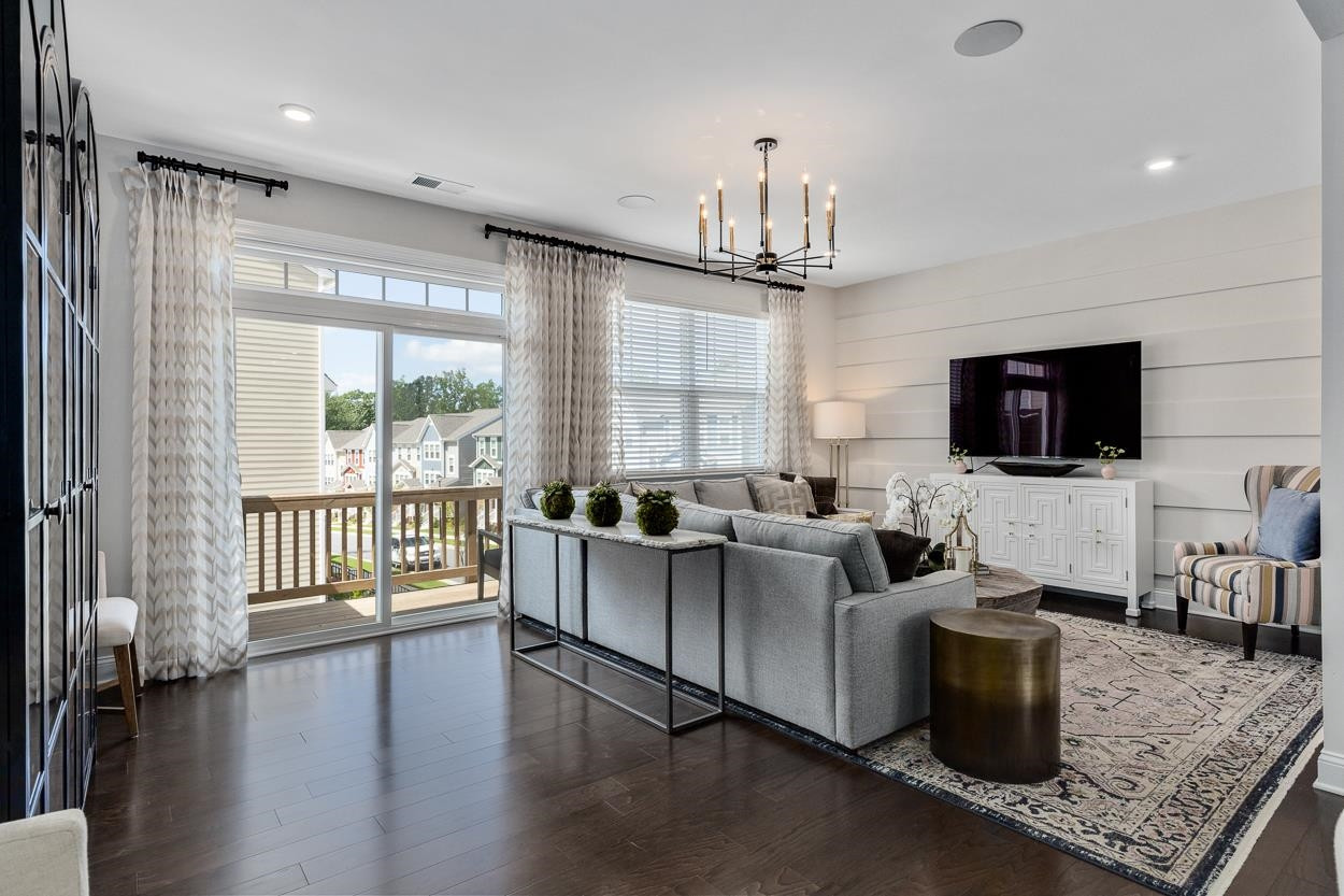 1002 Royal Mill Avenue Wake Forest, NC 27587 - Photo 13 of 51 a living room with furniture fireplace and a flat screen tv