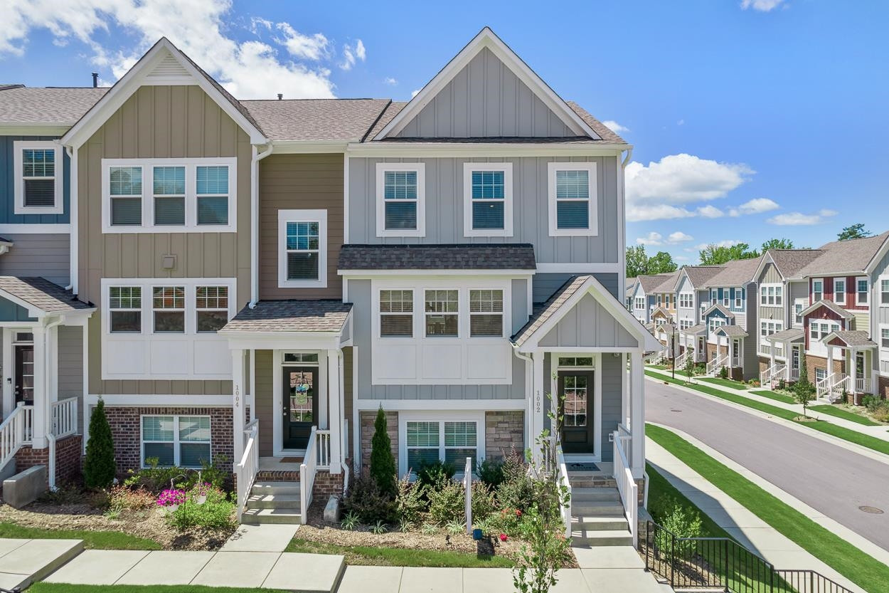 1002 Royal Mill Avenue Wake Forest, NC 27587 - Photo 2 of 51 a front view of a house with a yard