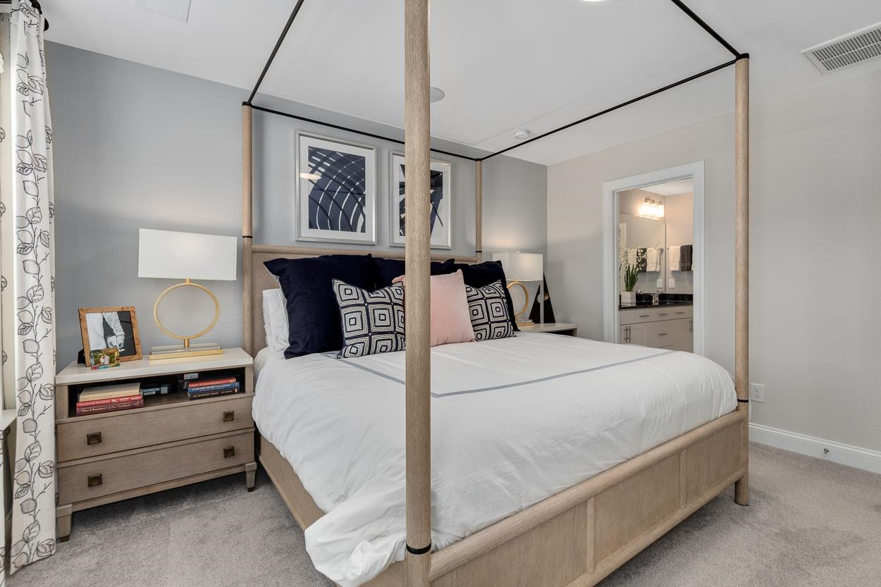 1002 Royal Mill Avenue Wake Forest, NC 27587 - Photo 22 of 51 a bed room with a bed and a night stand