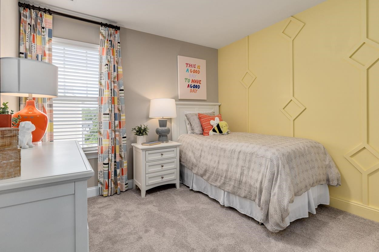 1002 Royal Mill Avenue Wake Forest, NC 27587 - Photo 29 of 51 a bedroom with a bed and a table