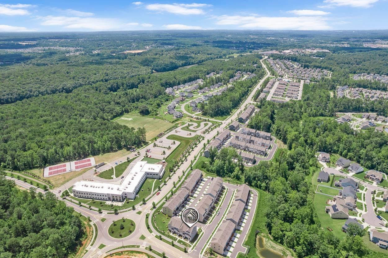 1002 Royal Mill Avenue Wake Forest, NC 27587 - Photo 36 of 51 an aerial view of a city with lots of residential buildings