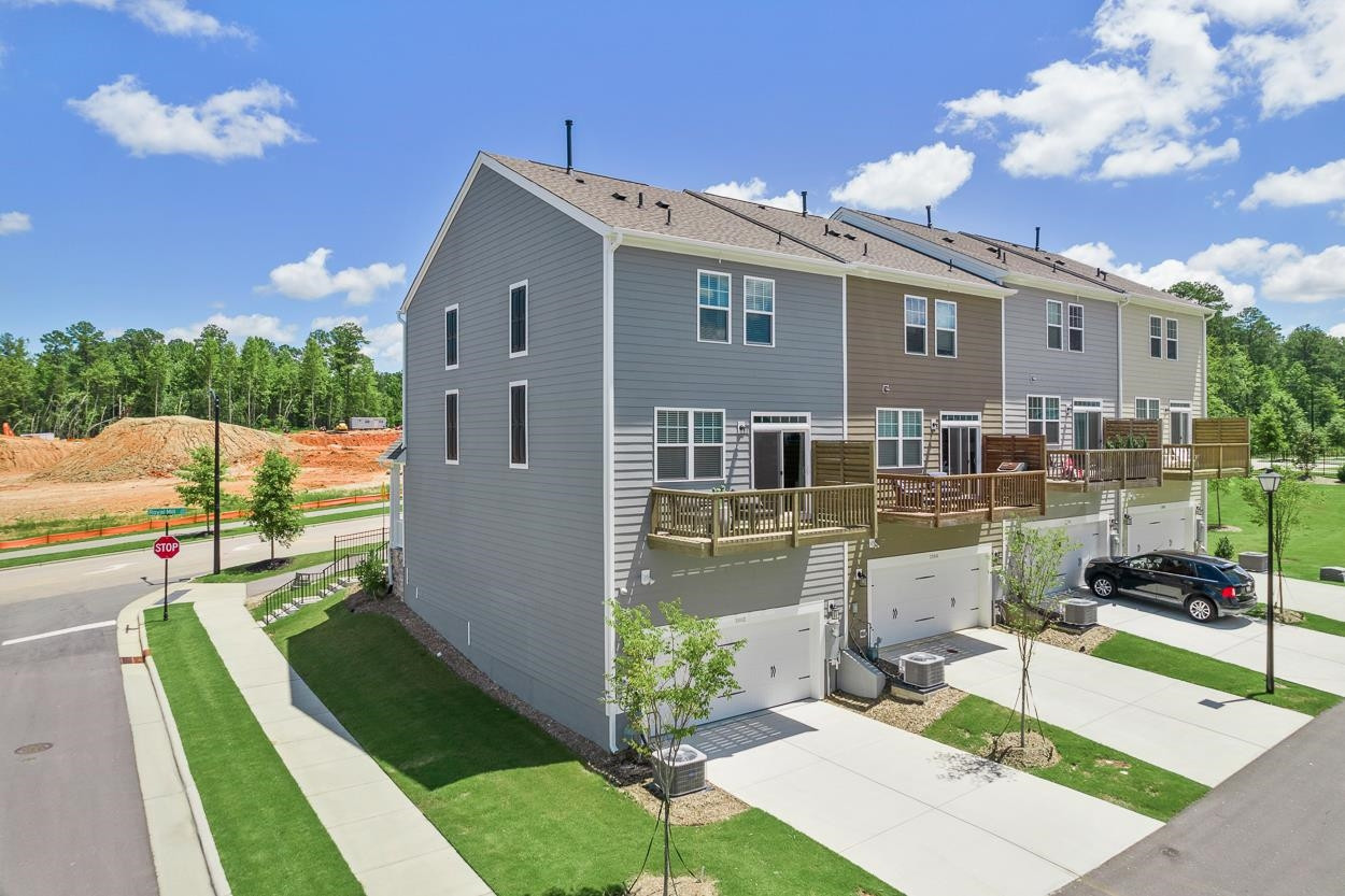 1002 Royal Mill Avenue Wake Forest, NC 27587 - Photo 39 of 51 a view of a house with backyard sitting area and garden