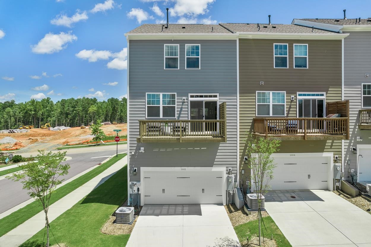 1002 Royal Mill Avenue Wake Forest, NC 27587 - Photo 40 of 51 a view of a house with a patio