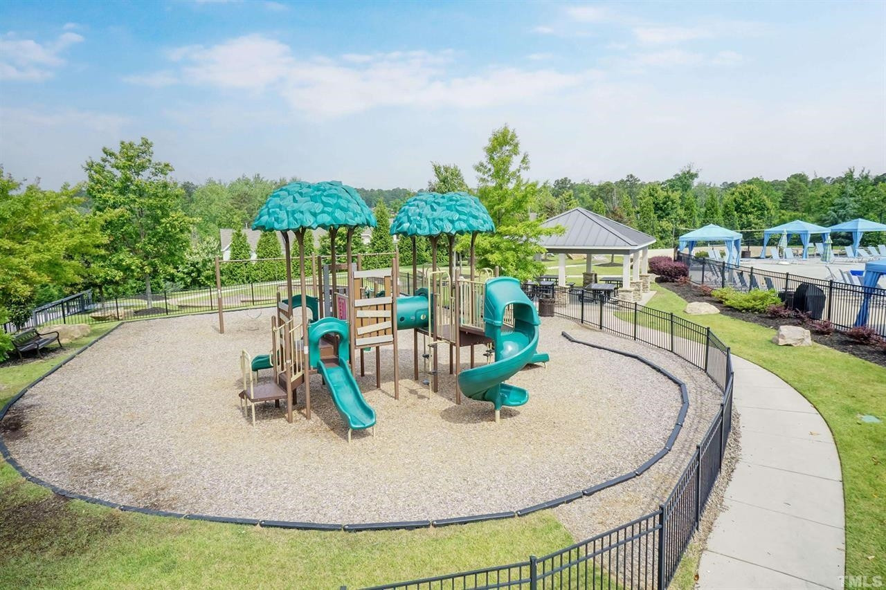 1002 Royal Mill Avenue Wake Forest, NC 27587 - Photo 48 of 51 an aerial view of a house with outdoor space patio and outdoor seating